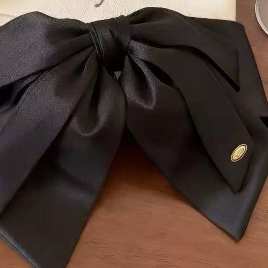 Black satin statement hair bow product photo