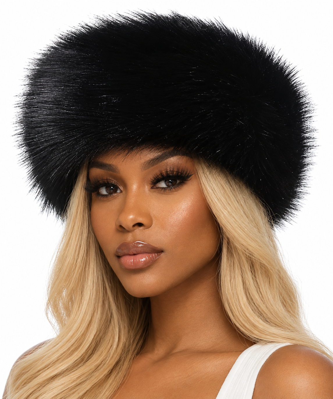 Black model with blonde hair wearing the original oversized plush black faux fur hat