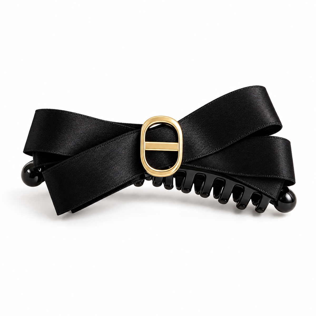 Black satin bow claw hair clip with gold-tone accent on a clean white background